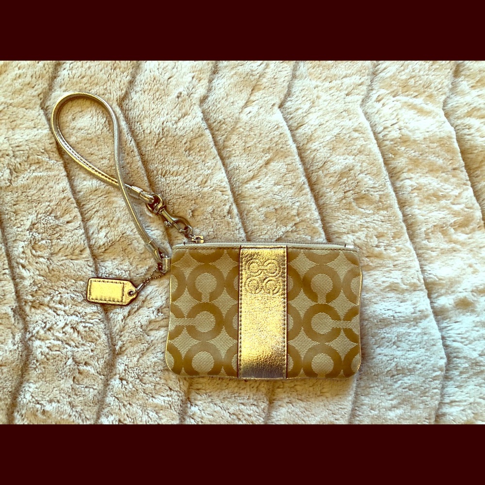 Gold coach wristlet